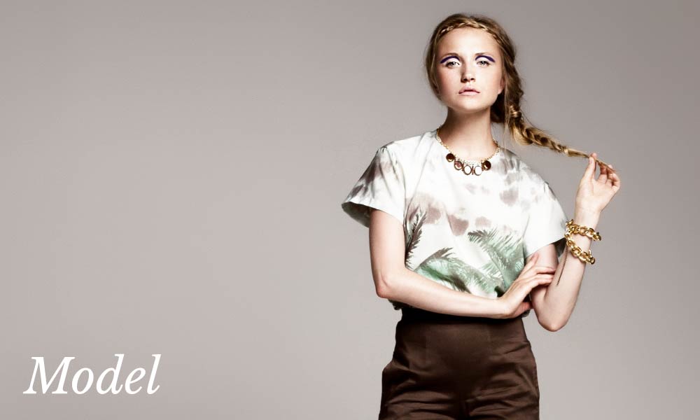 Model Showcasing Breasts After Weight Loss