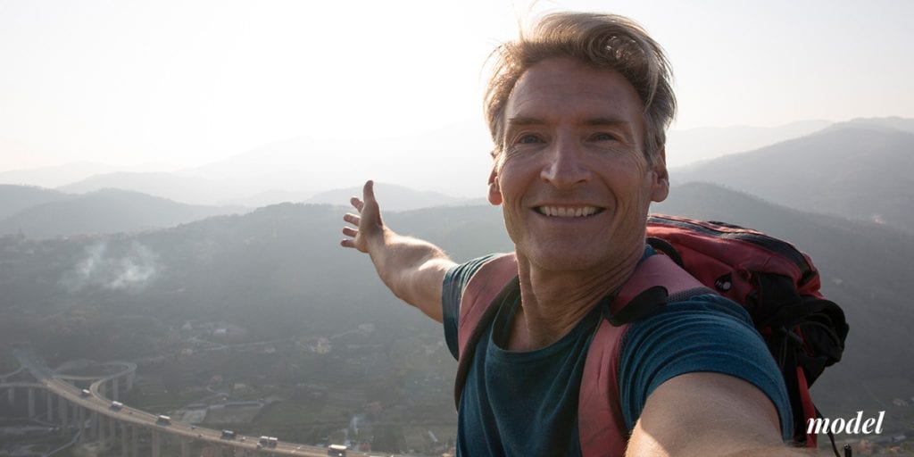 Middle Aged Man Hiking and Taking a Selfie | Westfield Plastic Surgery Center Middle Aged Man Hiking and Taking a Selfie
