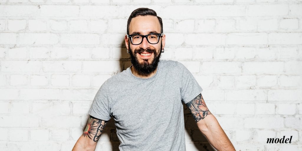Thin Man with Glasses Facial Hair and Tattoos on his Upper Arms | Westfield Plastic Surgery Center Thin Man with Glasses Facial Hair and Tattoos on his Upper Arms